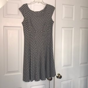 Black and white polka dot flair dress